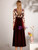 Close-up of the zipper back and velvet texture on a burgundy mother of the bride dress