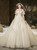 Demand Attention In Light Champagne Tulle Off the Shoulder Beading Wedding Dress