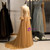 Gold Tulle Long Sleeve Backless Beading Prom Dress