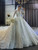 White Tulle Sequins Long Sleeve Backless Beading Wedding Dress