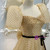 Champagne Wave Point Puff Sleeve Prom Dress