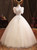 Champagne Tulle V-neck Puff Sleeve Quinceanera Dresses