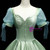 Green Satin Square Short Sleeve Button Quinceanera Dress