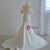 White Satin off the Shoulder Bow Pleats Wedding Dress