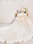 Lace up back detail on ivory satin ball gown wedding dress