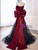 Full-length black off-the-shoulder tulle formal gown with bow accent