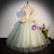 Green Tulle Sequins Off the Shoulder Pleats Quinceanera Dress