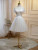 Ivory Tulle Straps Pleats Homecoming Dress