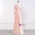 Beautiful long mother of the bride dress featuring a zipper back and delicate lace sleeves, shown in a soft, flowing chiffon fabric.