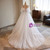 White Ball Gown Tulle Strapless Pleats Wedding Dress