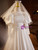 White Satin High Neck Long Sleeve Backless Wedding Dress