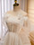 White Tulle Pearls Bow Homecoming Dress