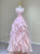 Pink tulle strapless prom dress with floral appliques - front view