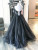 A-Line Black Tulle Sequins Strapless Prom Dress