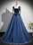 Navy blue tulle spaghetti strap prom dress front view
