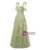 Sheer lace straps tied into dainty bows on green floral embroidery prom dress