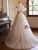 Champagne Tulle Spaghetti Straps Beading Wedding Dress