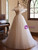 Champagne Tulle Spaghetti Straps Beading Wedding Dress