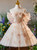 Off-shoulder neckline adorned with sculpted flowers on a homecoming dress that feels like spring