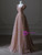 Close-up of shimmering sequin fabric on blush pink A-line prom dress