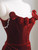 Strapless neckline on burgundy velvet mermaid formal gown