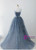 Lace-up back closure on blue tulle spaghetti strap prom dress with built-in bra