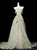 Green print tulle prom dress with strapless neckline and floral appliques