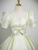 Light Yellow Short Sleeve Bow Quinceanera Dress