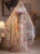 Champagne sequin mermaid prom dress with colorful floral embroidery and strapless bodice