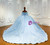 Romantic puff sleeve detail on blue tulle off shoulder wedding dress