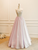 Lavender beaded prom gown with an elegant strapless neckline