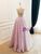 Light purple evening gown with a lace up back
