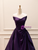 Flowing purple satin skirt with elegant structured pleats