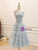 Strapless light blue party dress with a graceful A line silhouette