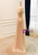  Side/back view showing the lace-up corset back of the gold prom dress.