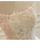 Profile view emphasizing the sweeping cathedral-length train of the outer tulle layer.
