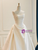Detail shot highlighting the rich luster and thick texture of the premium satin fabric.