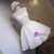 White A-line organza homecoming dress with lace appliques and beading