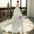 Ball Gown Ivory White Tulle Long Sleeve Backless Wedding Dress