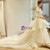 Ball Gown Ivory Long Sleeve Backless Appliques Wedding Dress
