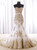 Mermaid white tulle wedding dress with gold lace appliqués