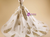 Back view of gold applique wedding dress with sweetheart neckline and train