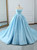 Blue strapless ball gown wedding dress with full satin skirt and delicate pleats on the bodice