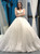 White Ball Gown Tulle Sequins Deep V-neck Backless Wedding Dress