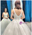 White Ball Gown Tulle Sequins Deep V-neck Backless Wedding Dress