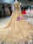 Champagne Gold Ball Gown Lace Long Sleeve Wedding Dress With Litter Train