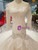 Champagne Tulle Mermaid Long Sleeve Backless Wedding Dress With Beading