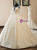 Champagne Tulle Sequins Long Sleeve Backless Wedding Dress With Beading