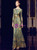 Bateau neckline and sequin embellishment detail on green long sleeve mother of the bride dress