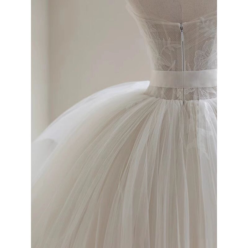 Ivory Strapless Designer Tulle Princess Tiered Wedding Ball Gown main image 0